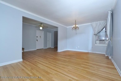 LOCATED IN THE HEART OF MIDWOOD, ON A BEAUTIFUL TREE-LINED