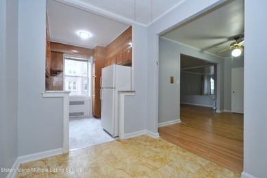 LOCATED IN THE HEART OF MIDWOOD, ON A BEAUTIFUL TREE-LINED