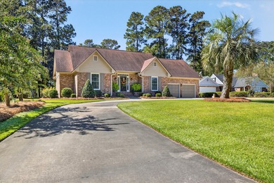 This beautiful brick home is perfectly situated on the scenic - photo 2