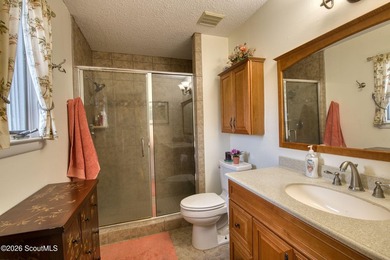 Tucked away where water meets wilderness, this 3-bedroom - photo 9