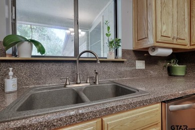 Nestled on a quiet street, this inviting residence blends - photo 17