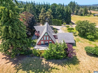 Nestled in the heart of sunny Sequim, this stunning A-frame home - photo 1
