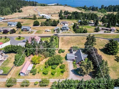 Nestled in the heart of sunny Sequim, this stunning A-frame home - photo 2