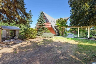 Nestled in the heart of sunny Sequim, this stunning A-frame home - photo 5