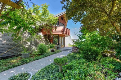 Nestled in the heart of sunny Sequim, this stunning A-frame home - photo 6