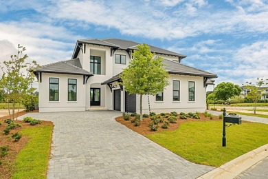 Located within the elevated Regatta Bay Golf & Yacht Club, this - photo 1