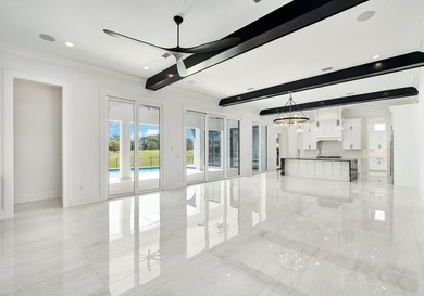Located within the elevated Regatta Bay Golf & Yacht Club, this - photo 5