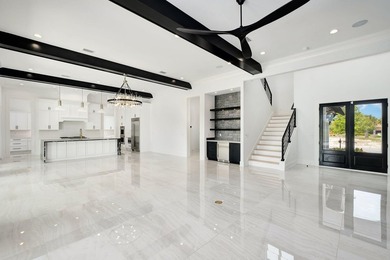 Located within the elevated Regatta Bay Golf & Yacht Club, this - photo 6