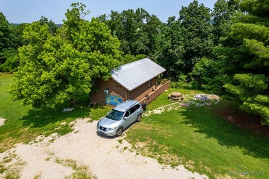 4 Cabins on roughly 2.5 acres adjoining the Warm Fork River and - photo 5