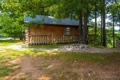 4 Cabins on roughly 2.5 acres adjoining the Warm Fork River and - photo 6