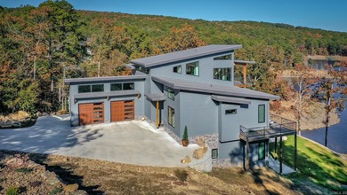 Breathtaking Modern Lakefront Retreat with Boat Slip Welcome to - Lake Home For Sale in Fairfield Bay, Arkansas