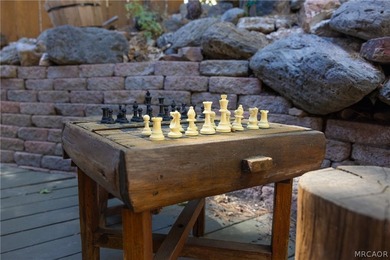 Perched among the trees in sought-after Moonridge, this - photo 8