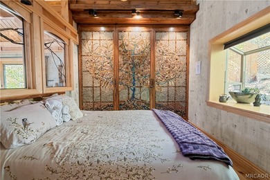 Perched among the trees in sought-after Moonridge, this - photo 9