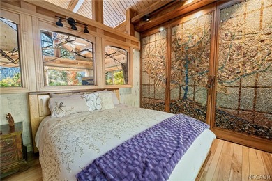 Perched among the trees in sought-after Moonridge, this - photo 10