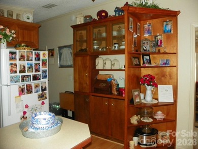Must see this adorable Park model with full room addition - photo 11
