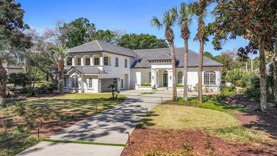 Elegantly positioned on a rare oversized waterfront corner lot - photo 1