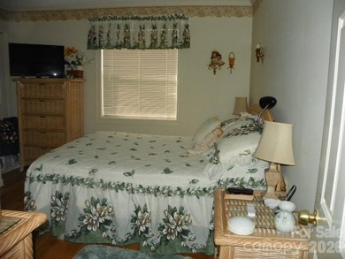 Must see this adorable Park model with full room addition - photo 13