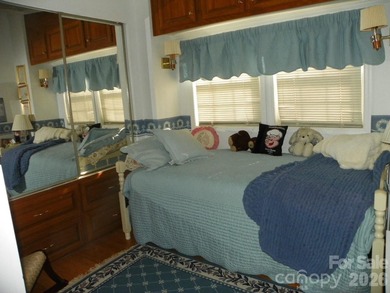 Must see this adorable Park model with full room addition - photo 15