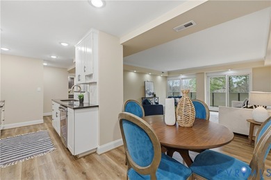 This is not your typical Hathaway Tower condominium! The