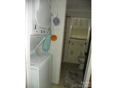 Must see this adorable Park model with full room addition - photo 18