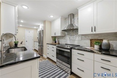 This is not your typical Hathaway Tower condominium! The