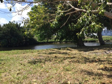 Meticulously maintained home in the much sought after Spanish - photo 3
