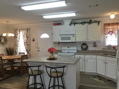 Meticulously maintained home in the much sought after Spanish - photo 6