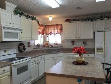 Meticulously maintained home in the much sought after Spanish - photo 8