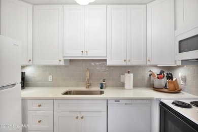 Adorable 2 bedroom, 1.5 bath beach cottage-style townhome! This - photo 6