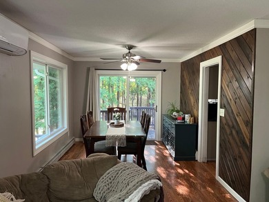 This spacious 5-bed, 3-bath walk-out home on Rainy River offers - photo 13