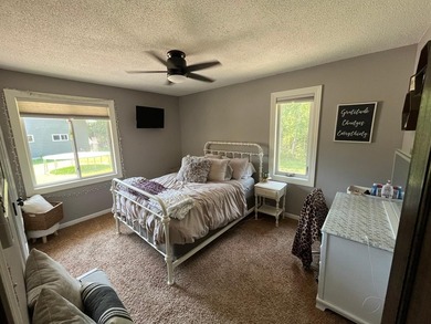 This spacious 5-bed, 3-bath walk-out home on Rainy River offers - photo 22