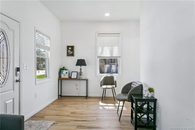 Just one block from the beach, this fully renovated 3-bedroom - photo 3