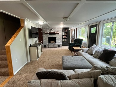 This spacious 5-bed, 3-bath walk-out home on Rainy River offers - photo 25