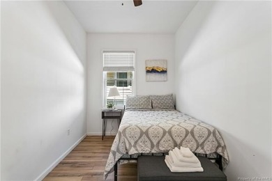 Just one block from the beach, this fully renovated 3-bedroom - photo 8