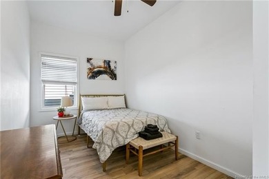 Just one block from the beach, this fully renovated 3-bedroom - photo 9