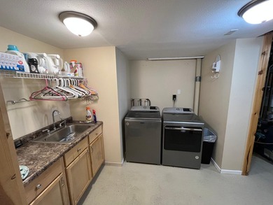 This spacious 5-bed, 3-bath walk-out home on Rainy River offers - photo 38