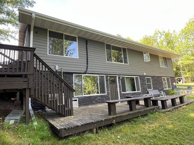 This spacious 5-bed, 3-bath walk-out home on Rainy River offers - photo 40