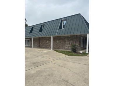 This spacious professional office building offers over 5,000