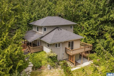 Amongst the trees on an acre this lovely 4 bed 2.5 bath home is - photo 1
