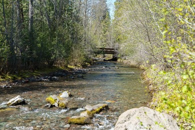Tucked into a quiet, tree filled setting, this exceptional - photo 13