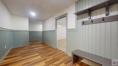 Step into this inviting brick beauty nestled on 2.19 acres of