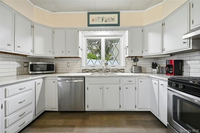This charming country home on a quiet street in Port Jefferson - photo 11