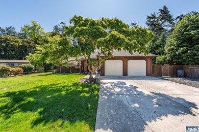 Nestled on a peaceful street in Sequim, this property backs - photo 2