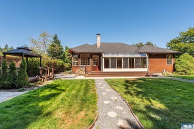 Nestled on a peaceful street in Sequim, this property backs - photo 3