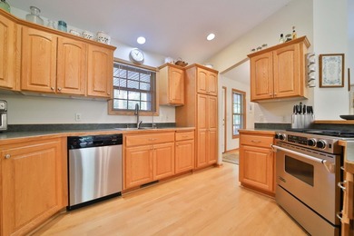 Don't miss this 4+ bedroom, three-bath executive home located in - photo 5