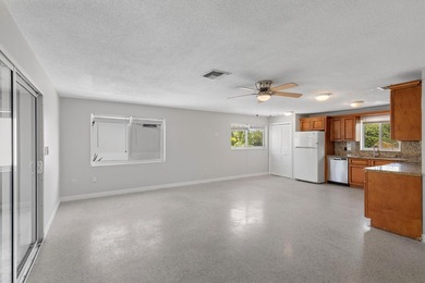 Waterfront duplex located on a wide, deep boating canal with - photo 11