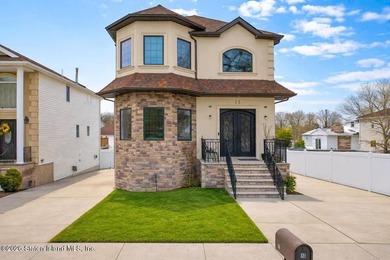 Spacious two-family Side Hall Colonial located on a quiet - photo 1