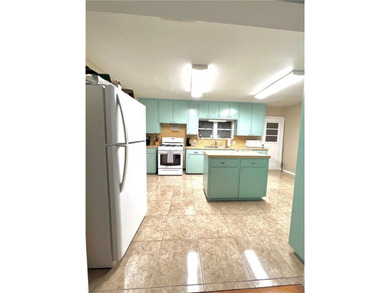 ROOM FOR EVERYTHING! This charming 2-bedroom, 1-bath home sits - photo 12