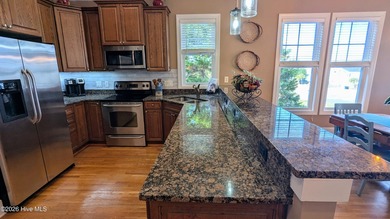 Pride of ownership in this stunning luxury townhome-style condo