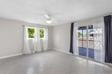Waterfront duplex located on a wide, deep boating canal with - photo 13